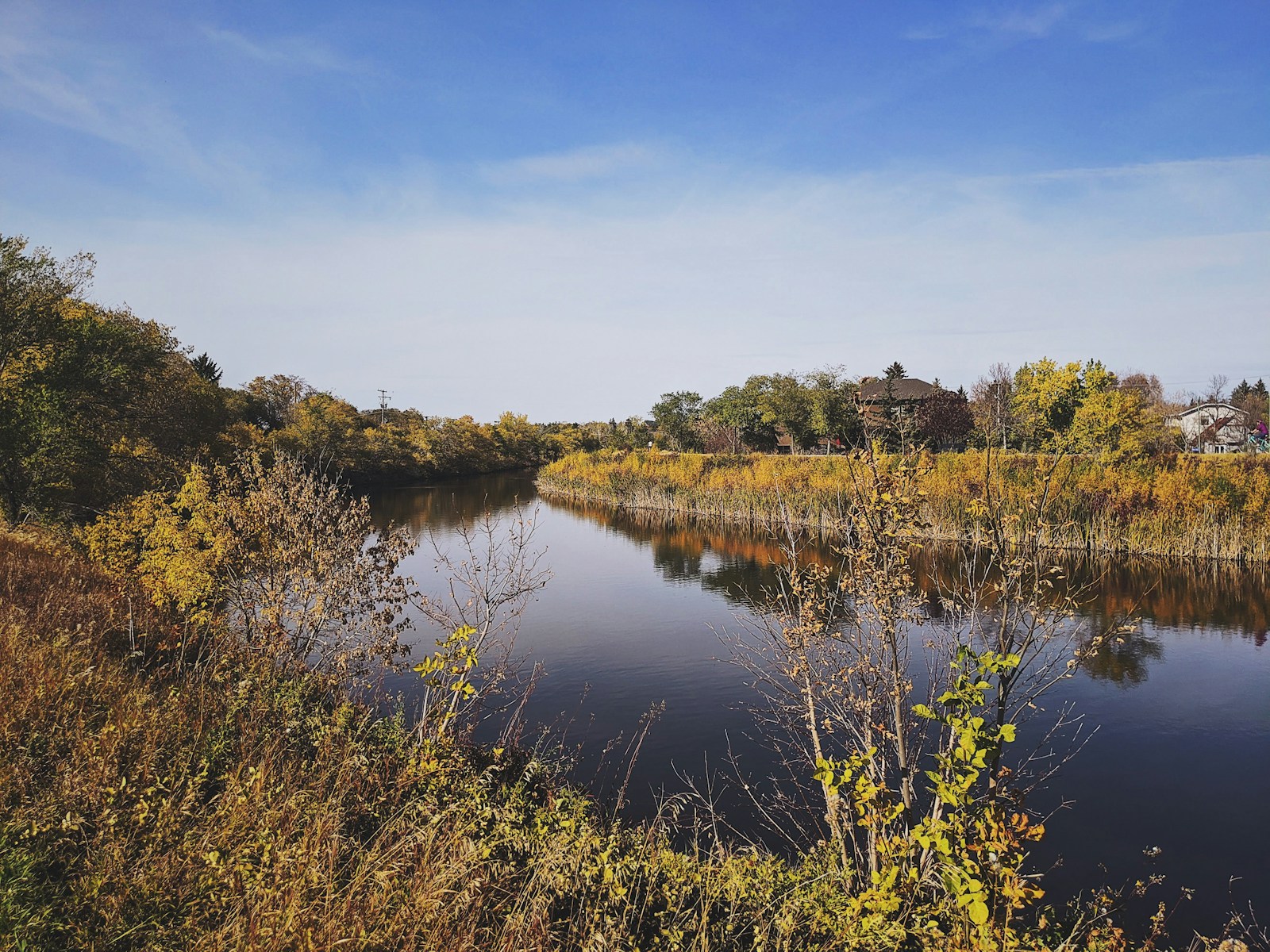 Buffalo Pound Lake calm water and prairie shoreline